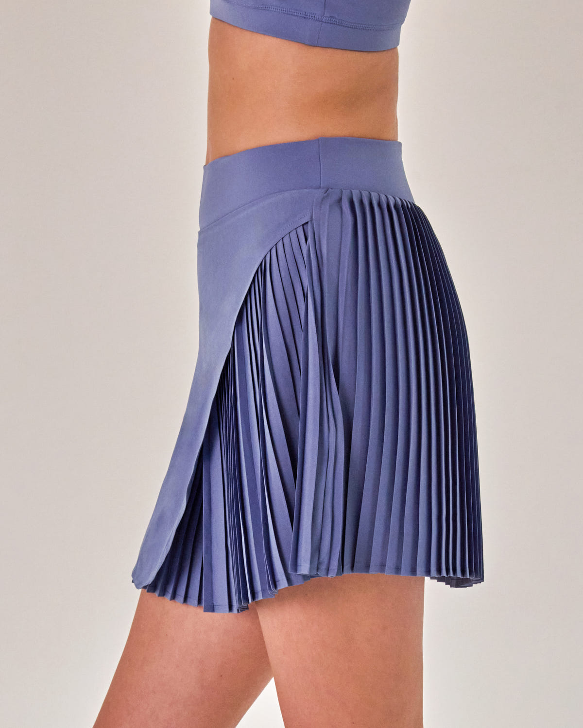 Beyond Court Varsity Pleated Skirt — crop side pleat in Heritage Blue