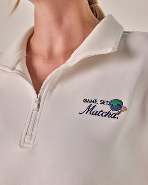 Beyond Court Courtside Quarter Zip Fleece — detail logo in Ivory