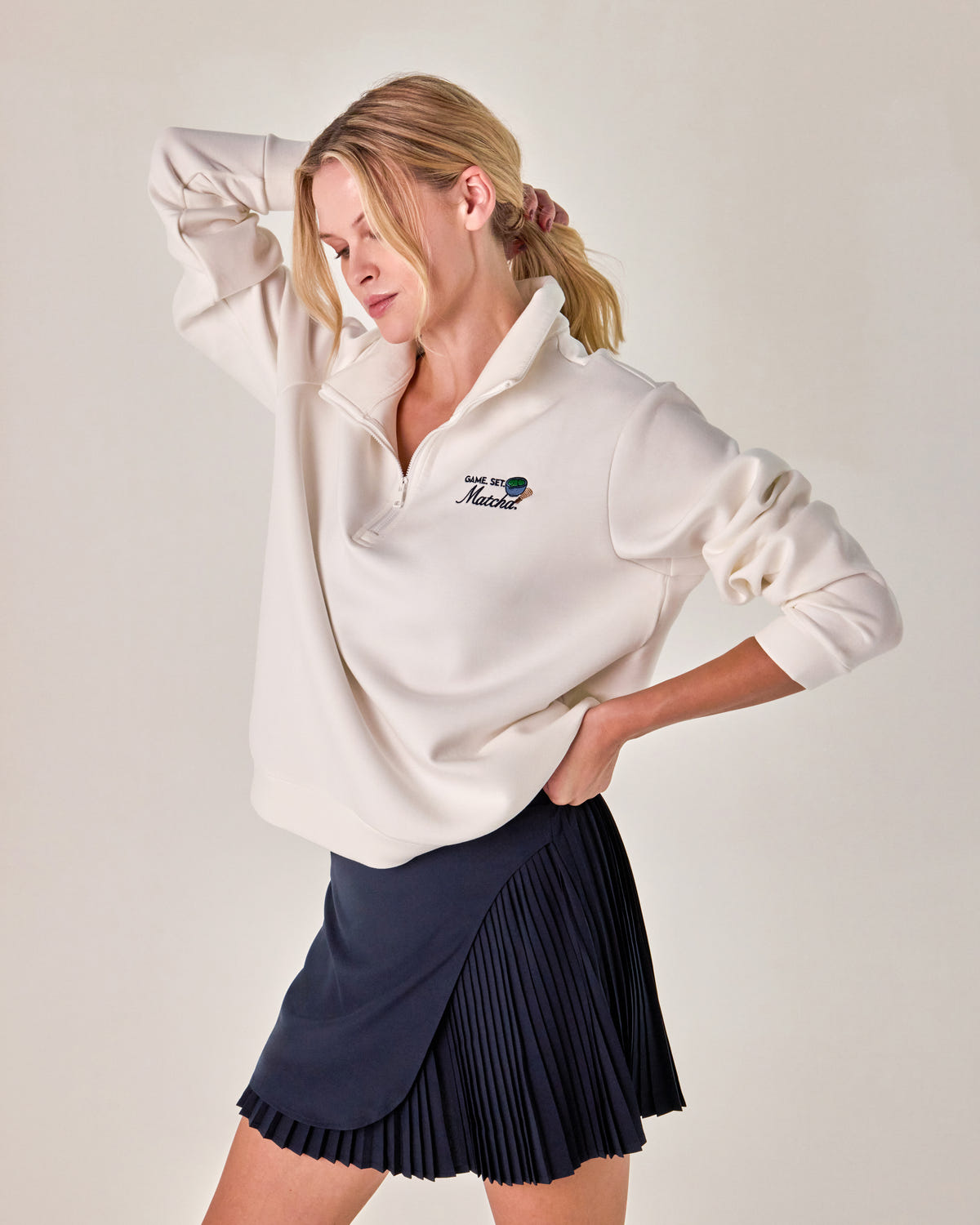 Beyond Court Courtside Quarter Zip Fleece — crop motion in Ivory