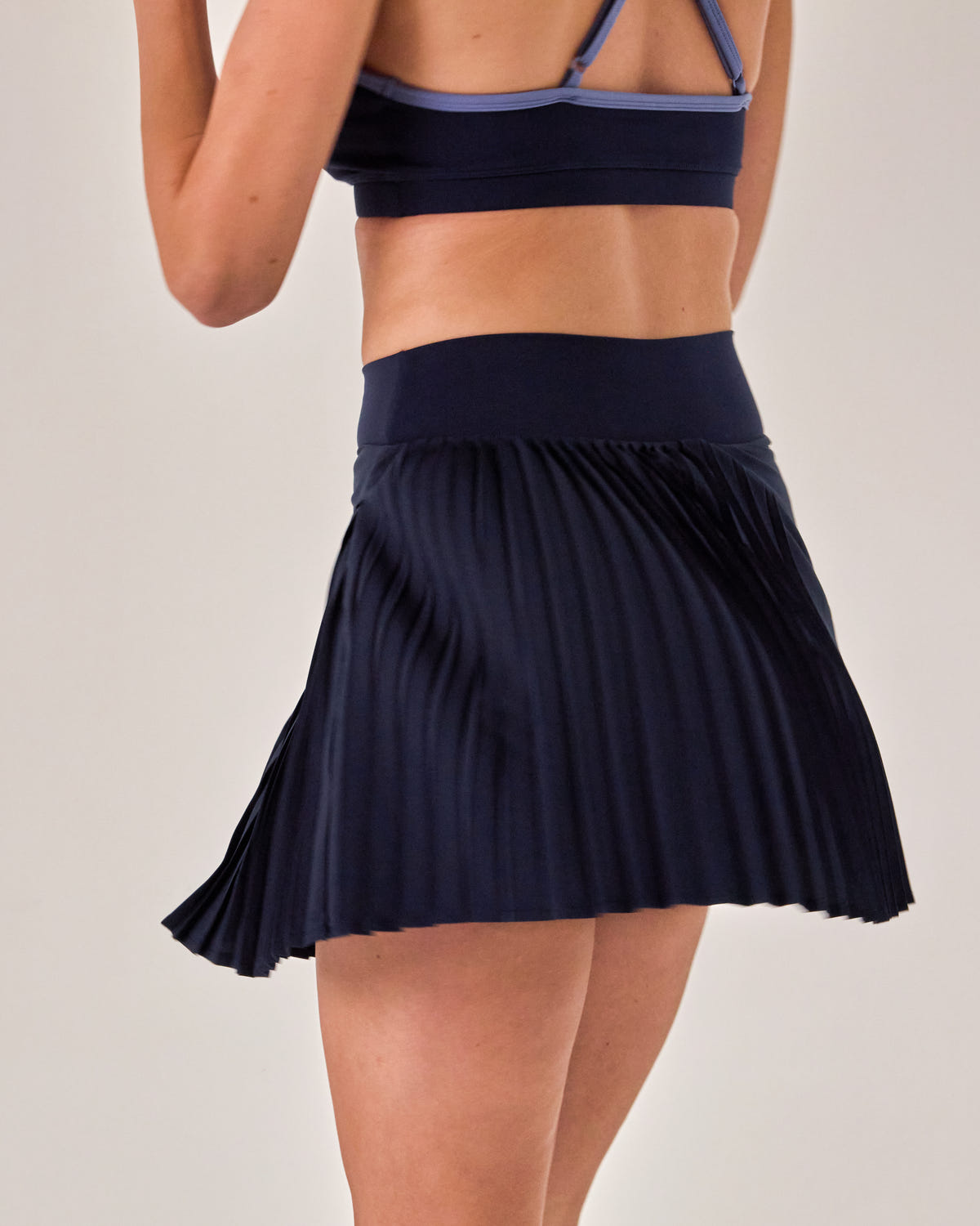 Beyond Court Varsity Pleated Skirt — crop back in Oxford Navy