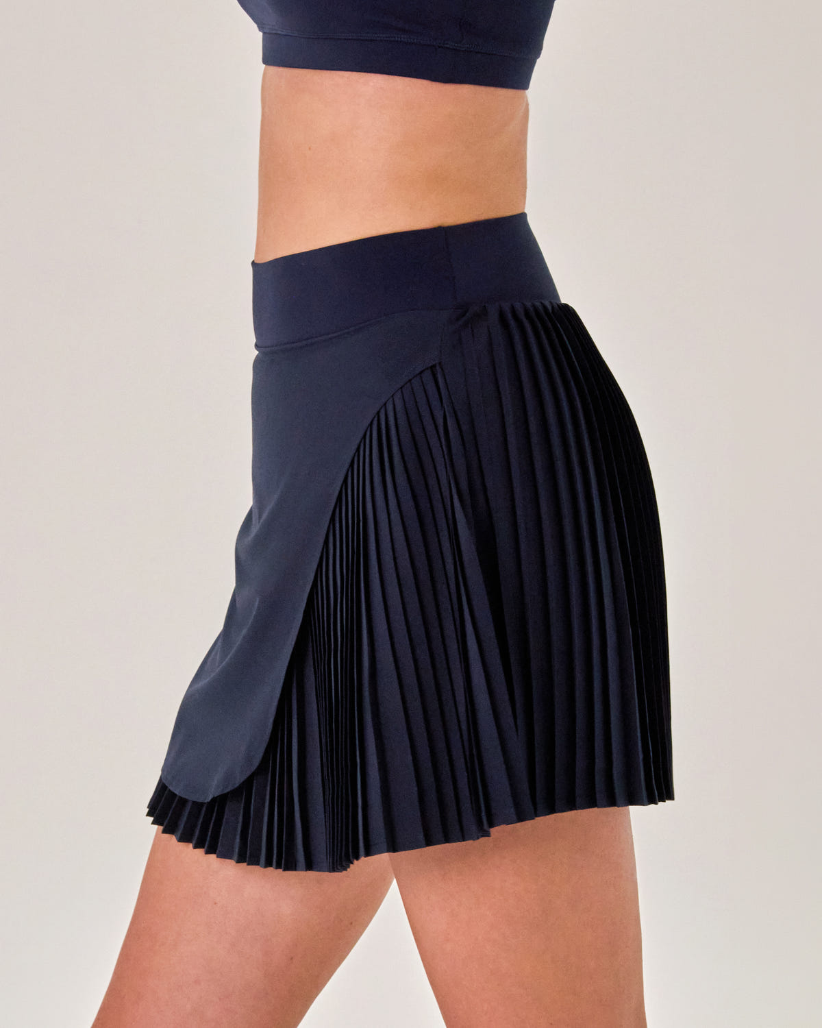 Beyond Court Varsity Pleated Skirt — crop side in Oxford Navy